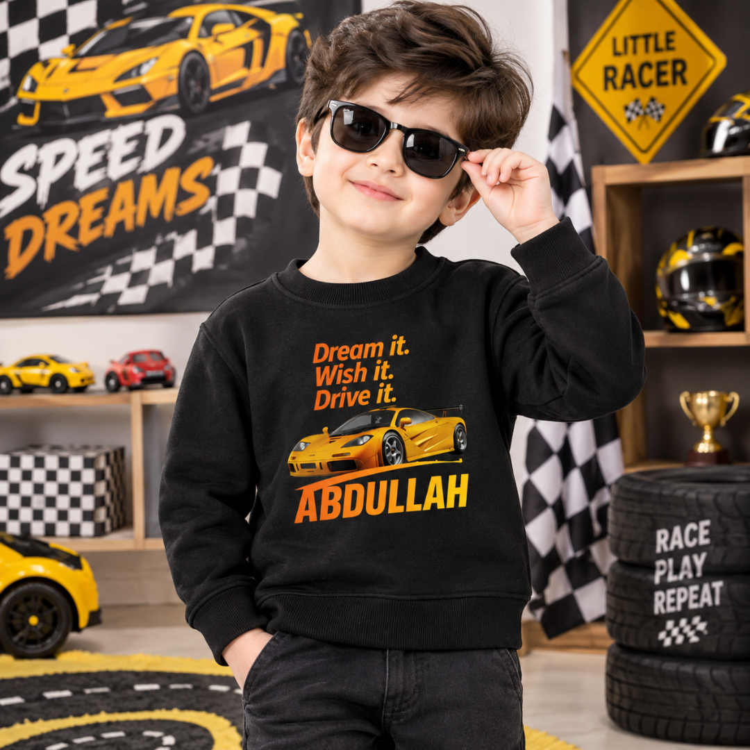 Child wearing black Abdullah sports car sweatshirt