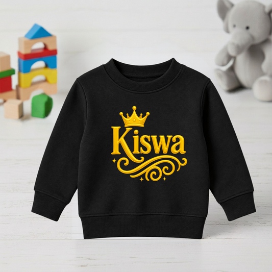 Black kids sweatshirt with gold-coloured Kiswa lettering and crown